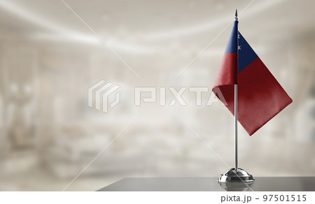 A small Samoa flag on an abstract blurry background 97501515