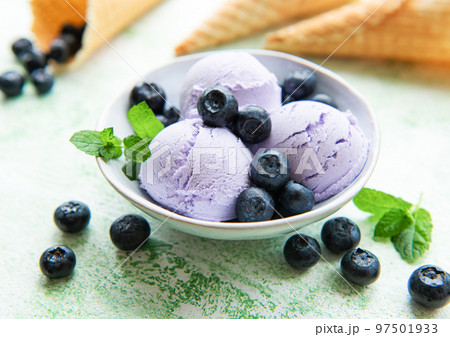 Homemade blueberry ice cream with fresh blueberries Homemade blueberry ice cream with fresh blueberries 97501933
