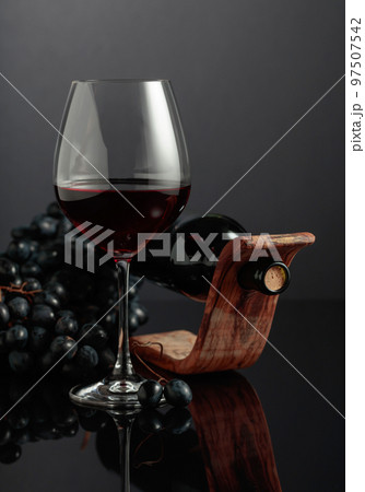 Red wine and blue grapes. Red wine and blue grapes. 97507542