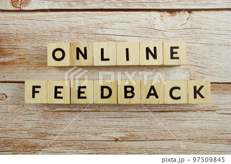 Online Feedback word alphabet letters on wooden background Online Feedback word alphabet letters on wooden background 97509845