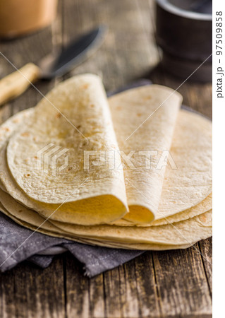 Mexican Corn Tortillas on wooden table. 97509858