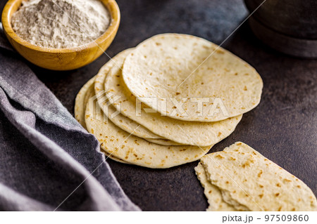 Mexican Corn Tortillas on kitchen table. 97509860