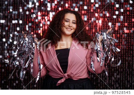 Girl with a curly hairstyle 97528545