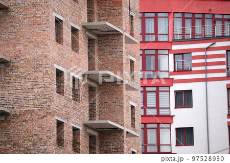 Architectural detail of high frame of monolithic concrete building under construction. Real estate development 97528930