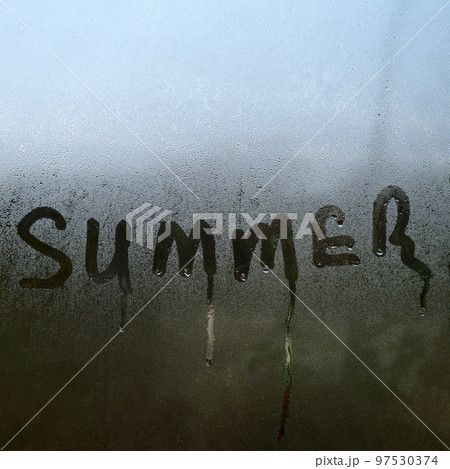 Summer inscription on the texture with condensation on the glass. Summer inscription on the texture with condensation on the glass. 97530374