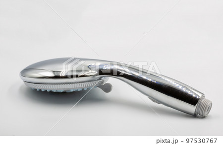 New chrome shower head water spray adjustable closeup on white 97530767