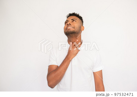 Irritated young man suffering from sore throat 97532471