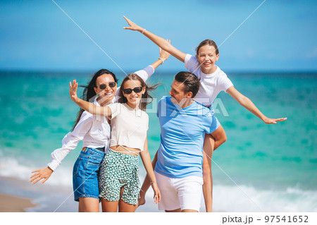 Young family on vacation have a lot of fun Young family on vacation have a lot of fun 97541652