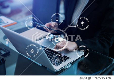 Copyright or patent concept, Person hand using laptop computer, tablet and smartphone with virtual screen copyright icon trademark, Creation ownership against piracy. 97545370