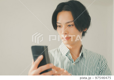 in his twenties in his twenties 97546475