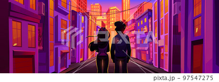 Couple walk on city street in evening Couple walk on city street in evening 97547275