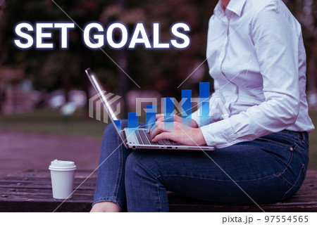Text showing inspiration Set Goals. Conceptual photo Defining or achieving something in the future based on plan 97554565