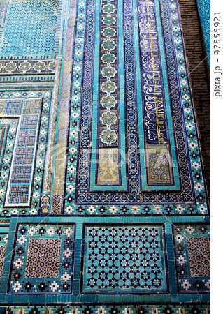 A fragment of the blue mosaic of the Shakhi-Zinda complex in Samarkand in Uzbekistan. Tourism. Journey through Central Asia. 29.04.2019 A fragment of the blue mosaic of the Shakhi-Zinda complex in Samarkand in Uzbekistan. Tourism. Journey through Central Asia. 29.04.2019 97555921