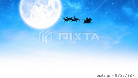 Image of santa claus in sleigh with reindeer over moon and sky 97557337