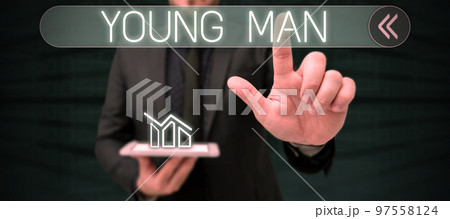 Hand writing sign Young Man. Business overview a man who is not far advanced in life a boy 97558124