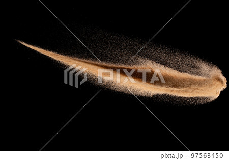 Small size fine Sand flying explosion, Golden grain wave explode. Abstract cloud fly. Yellow colored sand splash silica in Air, comet tail ice fall down to earth. Element Black background Isolated Small size fine Sand flying explosion, Golden grain wave explode. Abstract cloud fly. Yellow colored sand splash silica in Air, comet tail ice fall down to earth. Element Black background Isolated 97563450