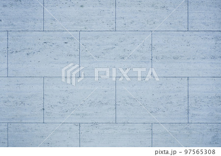 ブルートラバーチンテクスチャ_多孔質石材貼り壁背景素材 97565308