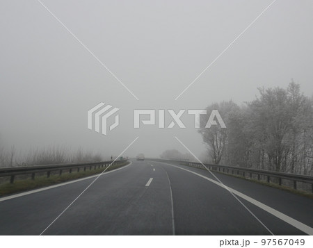 Highway in fog German Autobahn Highway in fog German Autobahn 97567049