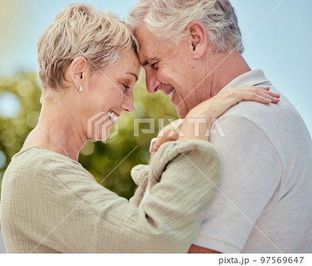 Hug, elderly and couple with love and trust in marriage, retirement and quality time outdoor, park with nature and commitment. Life partner, care and comfort, happy and retired, man and woman profile Hug, elderly and couple with love and trust in marriage, retirement and quality time outdoor, park with nature and commitment. Life partner, care and comfort, happy and retired, man and woman profile 97569647
