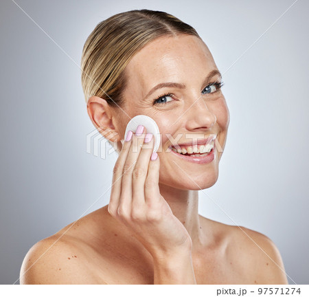 Woman, face or cotton pad for skincare grooming, dermatology cleaning product or facial acne treatment. Portrait, smile or happy beauty model with wipe for makeup cosmetics removal, cleanser or toner Woman, face or cotton pad for skincare grooming, dermatology cleaning product or facial acne treatment. Portrait, smile or happy beauty model with wipe for makeup cosmetics removal, cleanser or toner 97571274