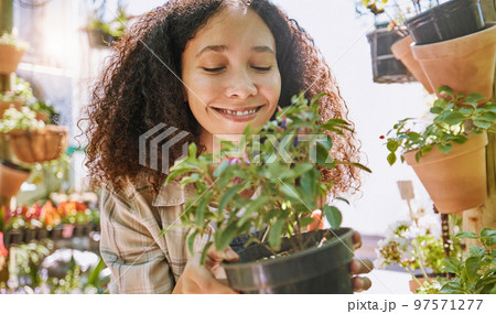 Plant, shopping and happy customer for gardening at eco friendly store offer, promotion or discount in summer growth success. Woman outdoor, green plants and spring sale startup for a zen lifestyle Plant, shopping and happy customer for gardening at eco friendly store offer, promotion or discount in summer growth success. Woman outdoor, green plants and spring sale startup for a zen lifestyle 97571277