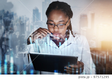 Black woman, digital overlay and tablet in office for researching finance data. City double exposure, graphs or female with touchscreen for networking, internet browsing or web scrolling in workplace 97571295