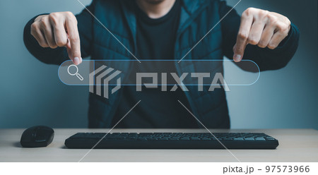 Data Search Technology Search Engine Optimization. man's hands showing a search bar and a computer keyboard and mouse to Searching for information. Using Search Console with your website. 97573966