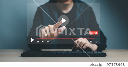 hands of man using mouse and keyboard computer for streaming online, watching video on internet, live concert, show or tutorial, online education, content creator. broadcast technology, hands of man using mouse and keyboard computer for streaming online, watching video on internet, live concert, show or tutorial, online education, content creator. broadcast technology, 97573968