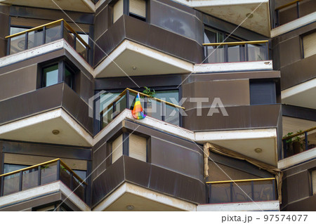 LGBT flag on balcony of apartment building LGBT flag on balcony of apartment building 97574077