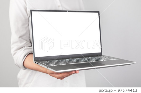 Hands holding laptop mockup. Person showing presentation at business meeting. Using computer technologies at work. Hands holding laptop mockup. Person showing presentation at business meeting. Using computer technologies at work. 97574413
