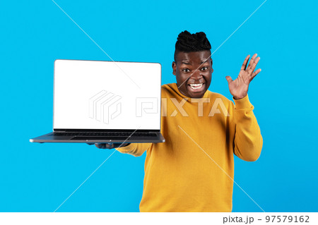 Great Website. Surprised Black Man Holding Laptop Computer With Blank White Screen 97579162