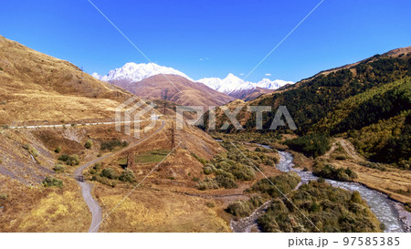 Mountain river valley from above 97585385