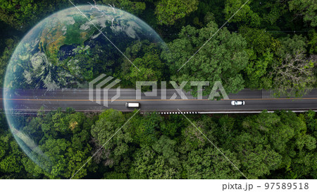 Eco car on forest road with earth planet going through forest, Ecosystem ecology healthy environment road trip travel, Eco car with nature, Electric car and earth EV electrical energy for environment. 97589518