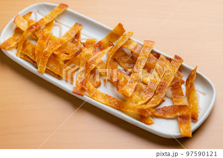 Cooked dried fish fillet snack Cooked dried fish fillet snack 97590121