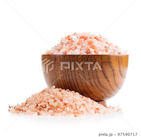 Pink himalayan salt in bowl isolated on white background. Pink himalayan salt in bowl isolated on white background. 97590717