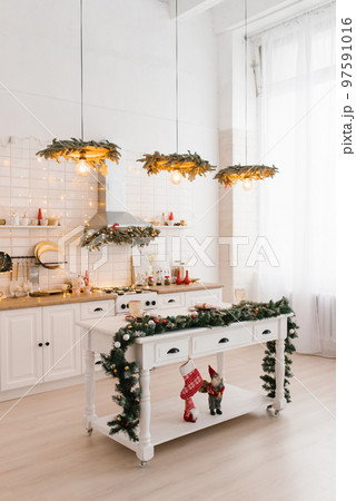 Beautiful new year christmas decor in scandinavian home kitchen interior 97591016