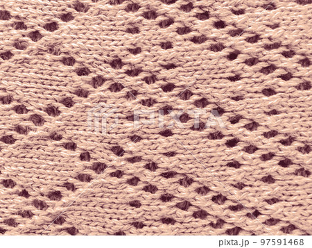 Organic knitted background with macro weave threads. Organic knitted background with macro weave threads. 97591468