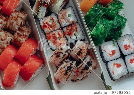 Beautiful delicious sushi. Sushi delivery Beautiful delicious sushi. Sushi delivery 97592056
