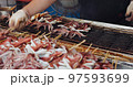 Grill squid in street market of Taiwan 97593699