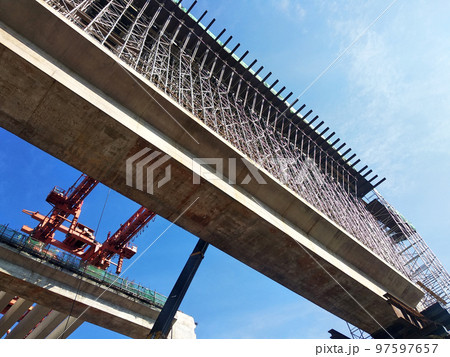 SELANGOR, MALAYSIA -JULY 6, 2022: An elevated road is under construction. Reinforced concrete is used for the structure. Construction is done in stages according to the sequence of works. SELANGOR, MALAYSIA -JULY 6, 2022: An elevated road is under construction. Reinforced concrete is used for the structure. Construction is done in stages according to the sequence of works. 97597657