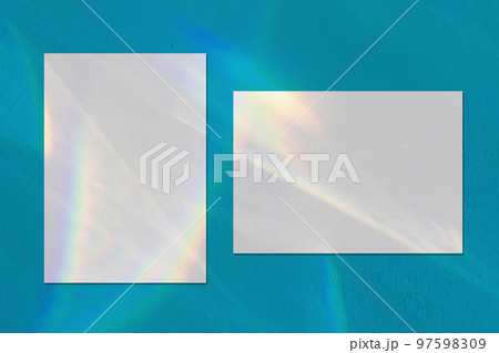 Two empty rectangle poster mockups on blue background Two empty rectangle poster mockups on blue background 97598309