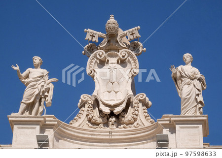 St. Vitalis, Alexander VII Coat of Arms, St. Petronilla, fragment of colonnade of St. Peters Basilica in Rome, Italy 97598633
