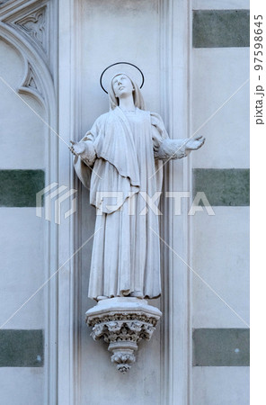 Statue of St. Margaret Mary Alacoque on the facade of Sacro Cuore del Suffragio church in Rome, Italy Statue of St. Margaret Mary Alacoque on the facade of Sacro Cuore del Suffragio church in Rome, Italy 97598645