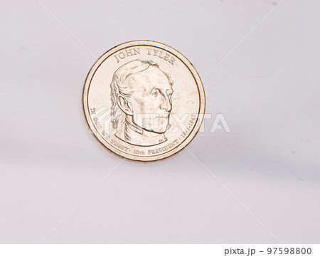 The four most commonly used American Coins. A quarter, dime, nickle, and penny isolated on a white background The four most commonly used American Coins. A quarter, dime, nickle, and penny isolated on a white background 97598800