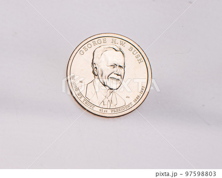 The four most commonly used American Coins. A quarter, dime, nickle, and penny isolated on a white background The four most commonly used American Coins. A quarter, dime, nickle, and penny isolated on a white background 97598803
