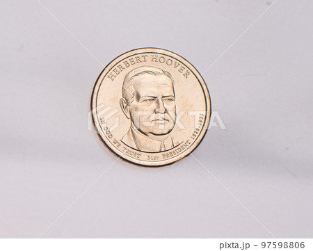 The four most commonly used American Coins. A quarter, dime, nickle, and penny isolated on a white background The four most commonly used American Coins. A quarter, dime, nickle, and penny isolated on a white background 97598806