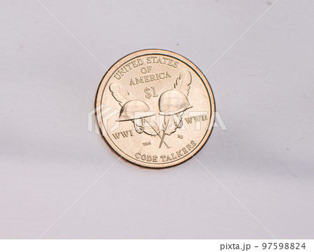 The four most commonly used American Coins. A quarter, dime, nickle, and penny isolated on a white background 97598824