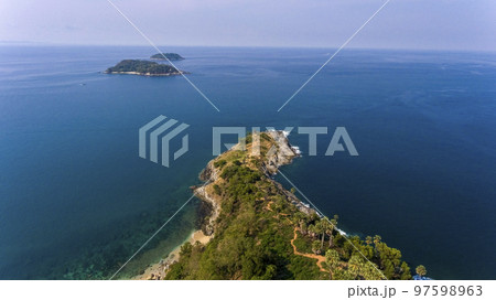 Promthep Cape is one of the most photographed locations in Phuket. Phromthep cape viewpoint at blue sea sky in Phuket, Thailand. 97598963