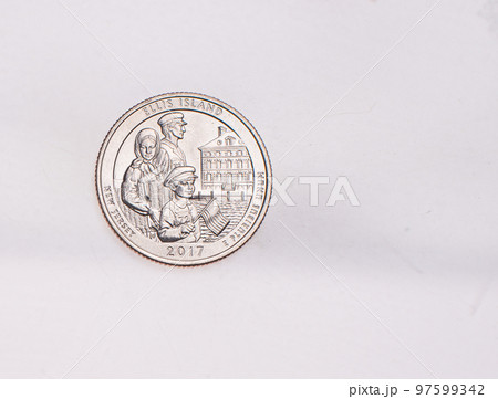 US Dollar coins President series $1 golden colored. The United States Mint honors our nation's presidents. Overhead flat lay 97599342