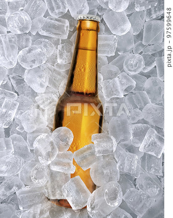 Beer bottle, ice cubea of juicy. Summer refreshing drink Beer bottle, ice cubea of juicy. Summer refreshing drink 97599648